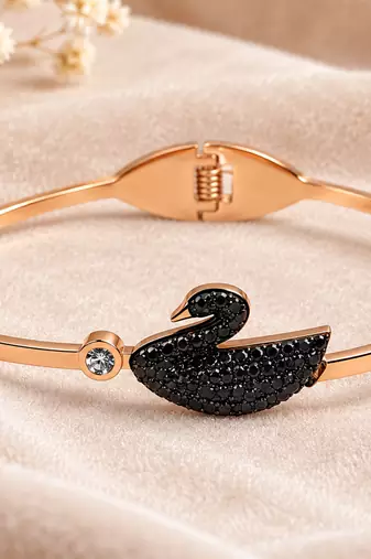 Black swan crystal bangle bracelet in rose gold tone