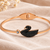 Black swan crystal bangle bracelet in rose gold tone