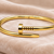 Gold-tone nail bangle bracelet, wrap-around cuff