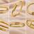 Gold-tone nail bangle bracelet, wrap-around cuff