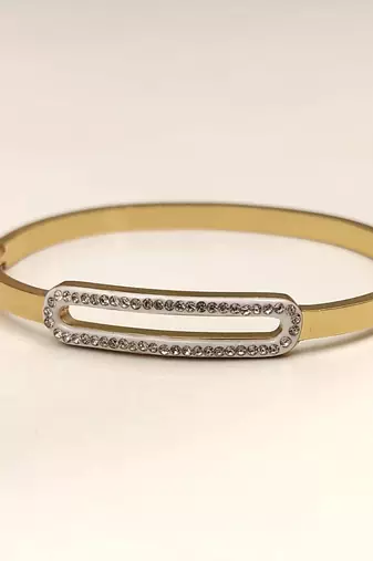 Gold-tone bangle bracelet with crystal oval centerpiece