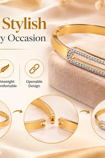 Gold-tone bangle bracelet with crystal oval centerpiece
