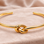 Gold-tone knot cuff bracelet for women, open bangle