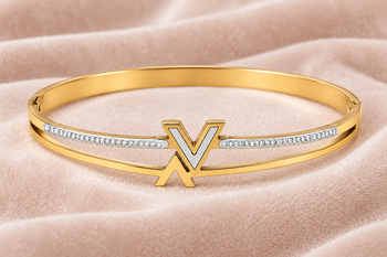 Gold-tone bangle bracelet with v logo charm and crystal accents 1