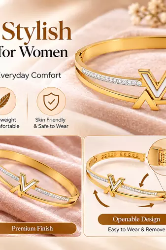 Gold-tone bangle bracelet with v logo charm and crystal accents