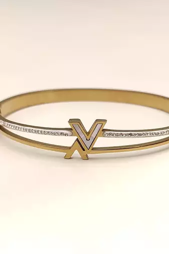 Gold-tone bangle bracelet with v logo charm and crystal accents