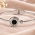 Roman numeral bangle bracelet, silver stainless steel with crystal