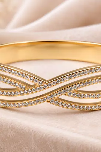 Gold-tone crystal pave infinity bangle bracelet for women