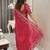 red embroidered saree with blouse piece