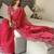 red embroidered saree with blouse piece