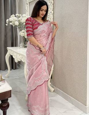 pink women ethnic motifs embroidered saree 1