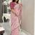 pink women ethnic motifs embroidered saree