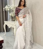white ethnic motifs embroidered saree