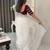 white ethnic motifs embroidered saree