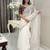 white ethnic motifs embroidered saree