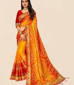 yellow yellow & red bandhani printed sequinned saree