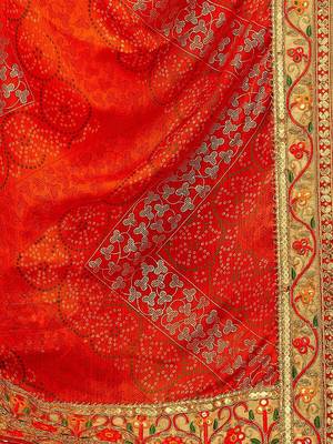Orange bandhani printed sequinned saree 4