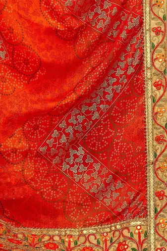 Orange bandhani printed sequinned saree