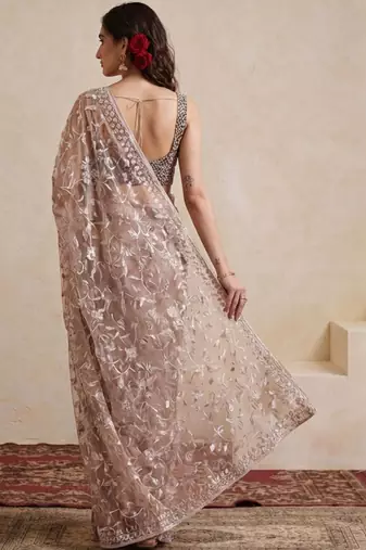 beige embellished embroidered net designer saree