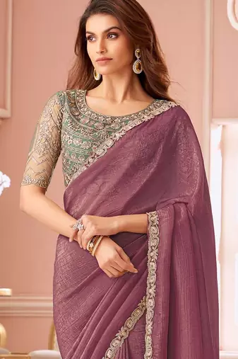 Purple embellished sequinned pure georgette saree