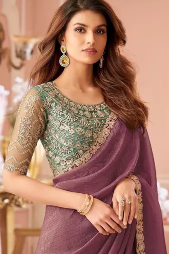 Purple embellished sequinned pure georgette saree