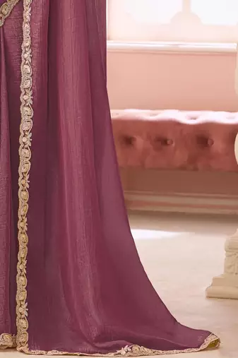 Purple embellished sequinned pure georgette saree