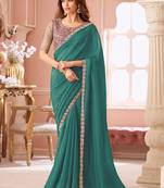 teal embellished sequinned pure georgette saree