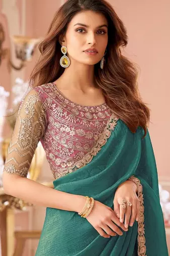 teal embellished sequinned pure georgette saree