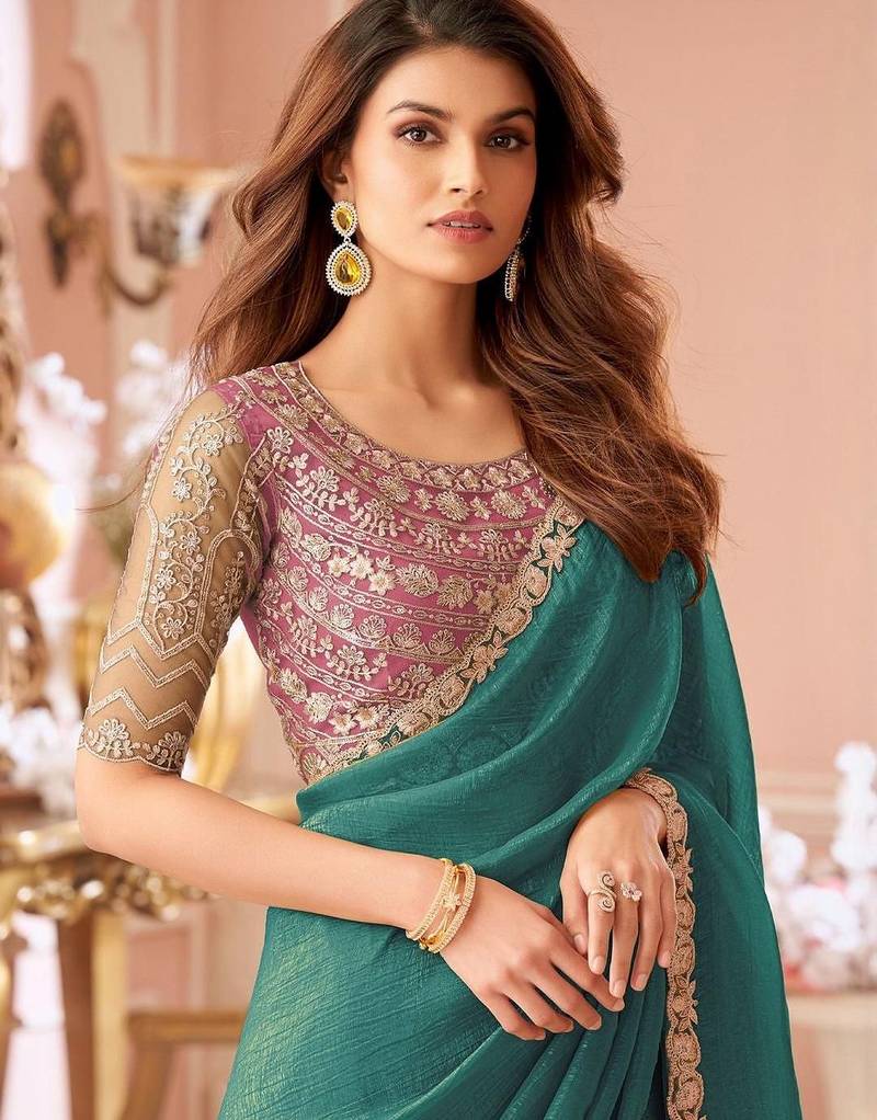 teal embellished sequinned pure georgette saree