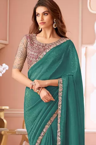 teal embellished sequinned pure georgette saree