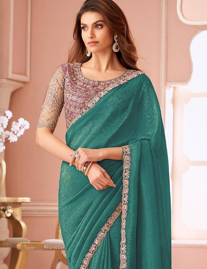 teal embellished sequinned pure georgette saree