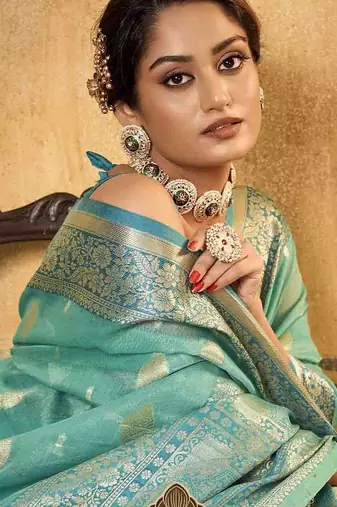 turquoise woven design zari saree