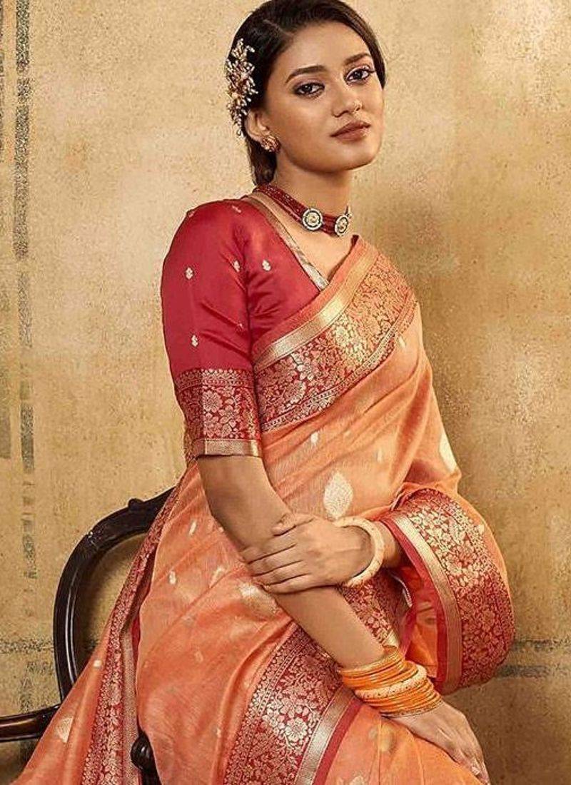 peach ethnic motifs zari saree with blouse piece