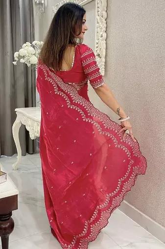red floral embroidered saree with stitched blouse