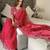 red floral embroidered saree with stitched blouse