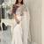 white jimmychoo silk embroidery work saree