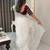 white jimmychoo silk embroidery work saree