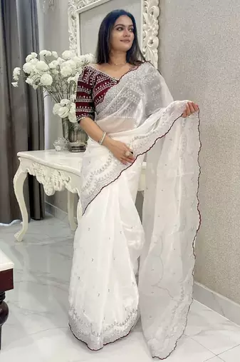 white jimmychoo silk embroidery work saree