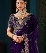 Purple ethnic motifs zari heavy work saree