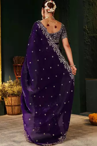 Purple ethnic motifs zari heavy work saree