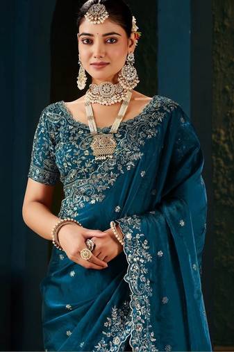 teal floral embroidered heavy work saree