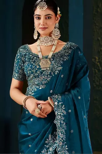 teal floral embroidered heavy work saree