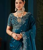 teal floral embroidered heavy work saree