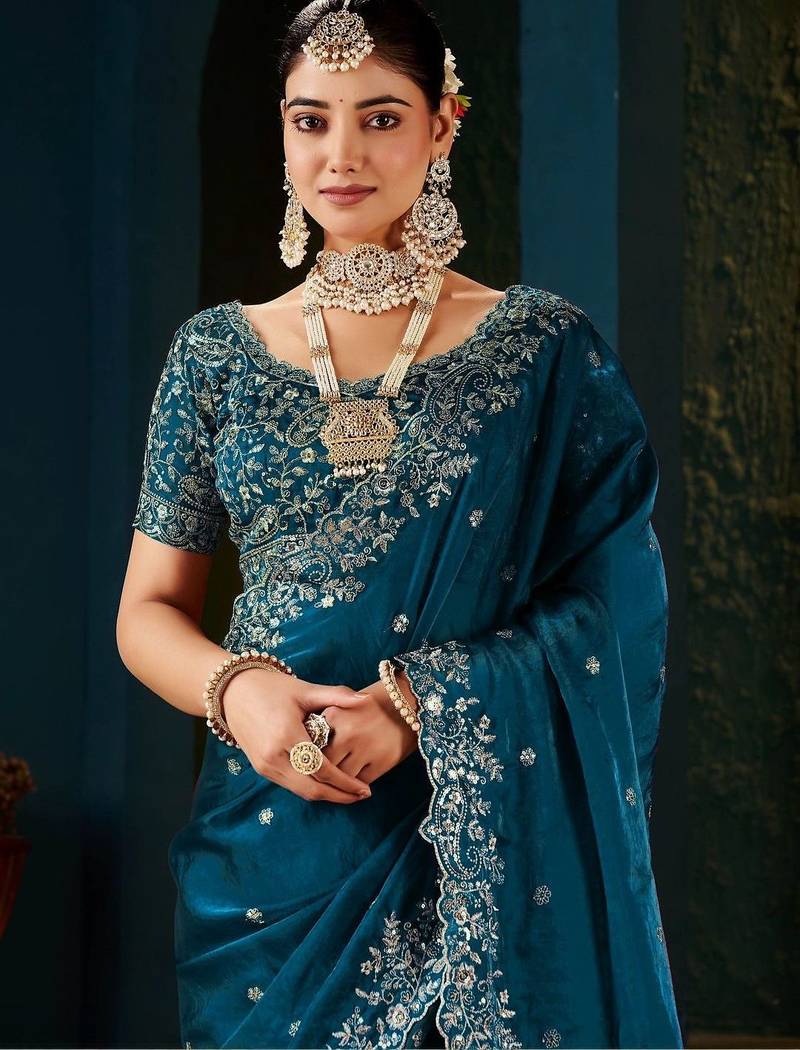 teal floral embroidered heavy work saree