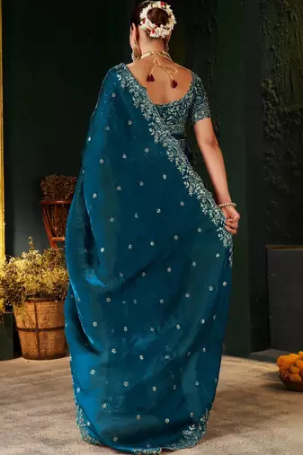 teal floral embroidered heavy work saree