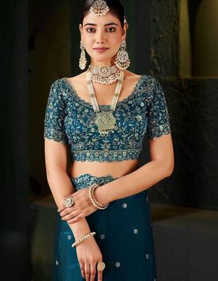 teal floral embroidered heavy work saree 3