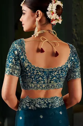 teal floral embroidered heavy work saree