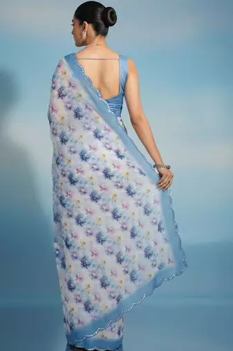 Off white floral sequinned satin saree