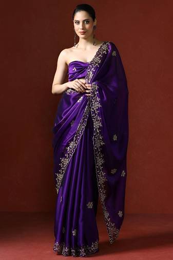 Purple ethnic motifs embroidered sequinned saree