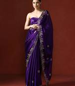 Purple ethnic motifs embroidered sequinned saree